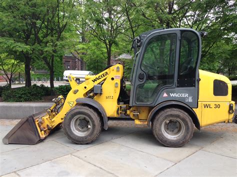 skid steer articulating arm|articulated wheel loader.